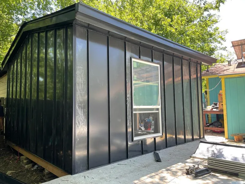 Black standing seam metal wall panels for Metal Roof Installation in East Grand Rapids